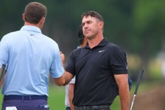 Brooks Koepka at back, Scottie Scheffler lurking behind Byron Nelson.