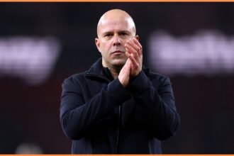 Liverpool manager Arne Slot applauds the fans after the Arsenal game