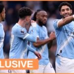 Omar Marmoush celebrates with his Manchester City teammates