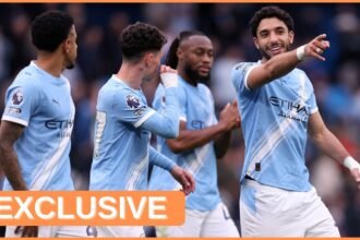 Omar Marmoush celebrates with his Manchester City teammates