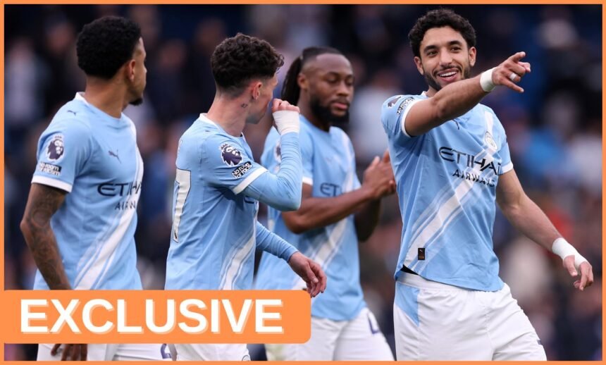 Omar Marmoush celebrates with his Manchester City teammates
