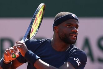 Francis Tiafoe collects racket from fan after French Open celebration