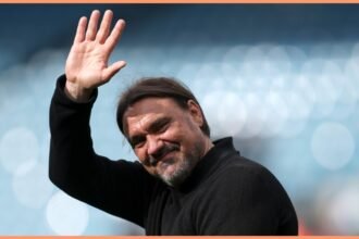 Leeds manager Daniel Farke waves to supporters