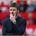 Manchester United interim manager Michael Carrick looks on