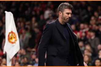 Michael Carrick walks down the tunnel after Man United