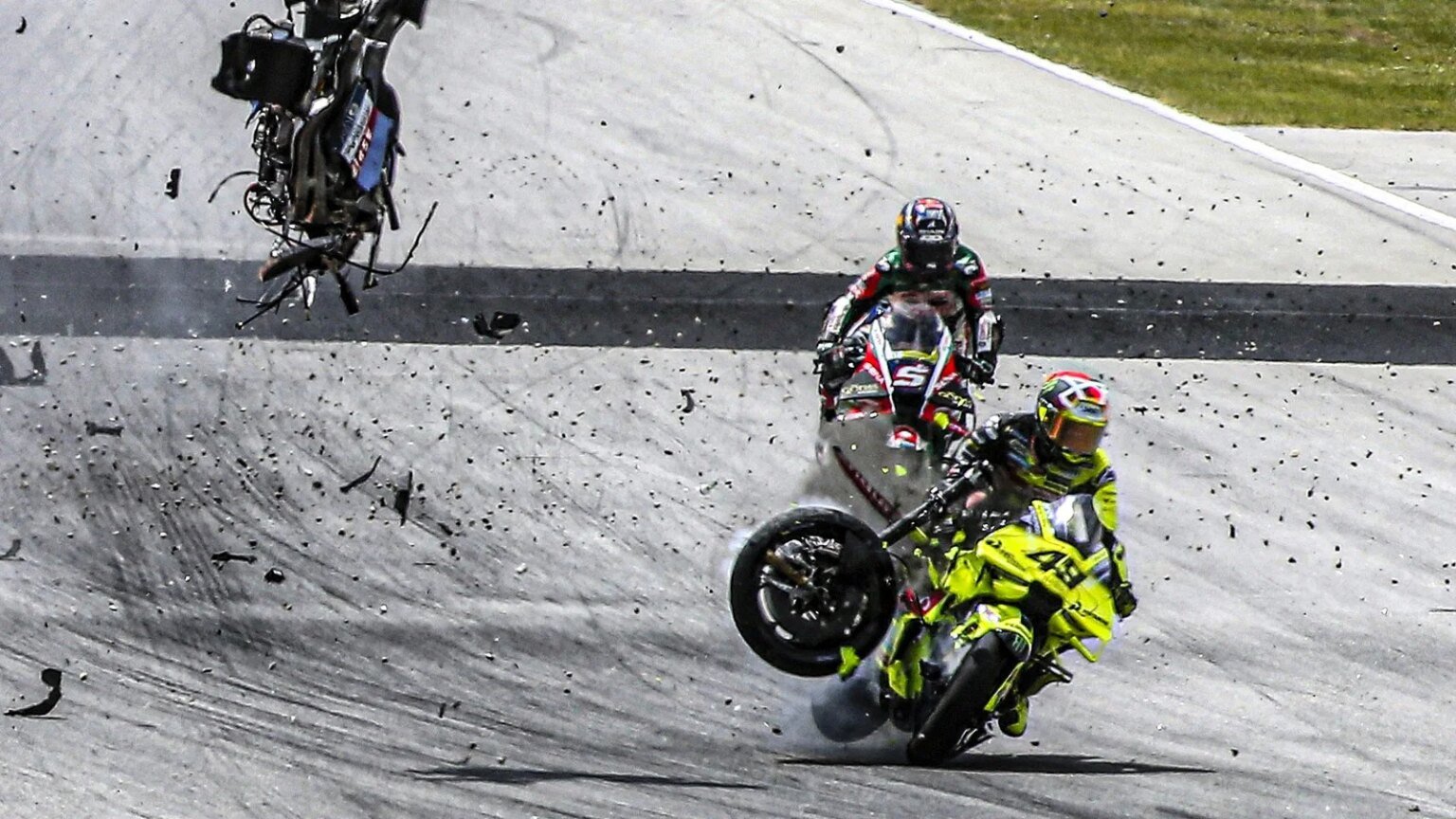 Fabio di Giannantonio hit by debris from Alex Marquez