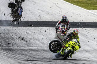 Fabio di Giannantonio hit by debris from Alex Marquez