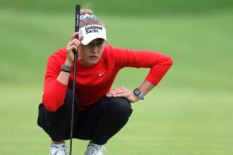 Midway through the U.S. Women's Open, Nelly Korda changes into the shoes LeBron gave her.