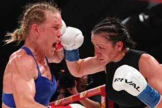 Protesters score points after Holly Holm loses close decision to Stephanie Hung in championship rematch