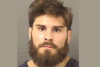 Royal Air Force officer Giorgio Poulas arrested for allegedly punching his sister's groom's brother through a glass table