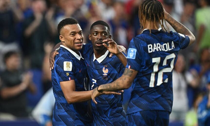 Barcola celebrating with Mbappe and Dembele