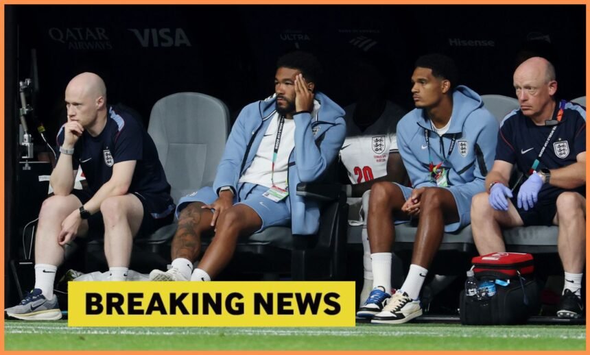 Reece James watches on from the England bench