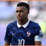 France star Kylian Mbappe looks on