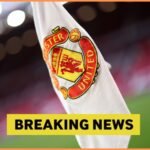 Manchester United corner flag and breaking news banner