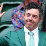 Rory McIlroy wears the green jacket from his Masters victory at Wimbledon