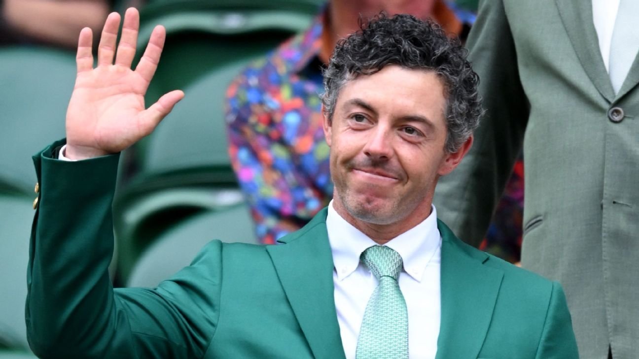 Rory McIlroy wears the green jacket from his Masters victory at Wimbledon
