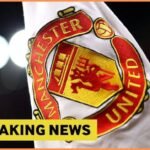 Man United flag with overlay of breaking news