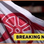 Arsenal flag with breaking news overlay